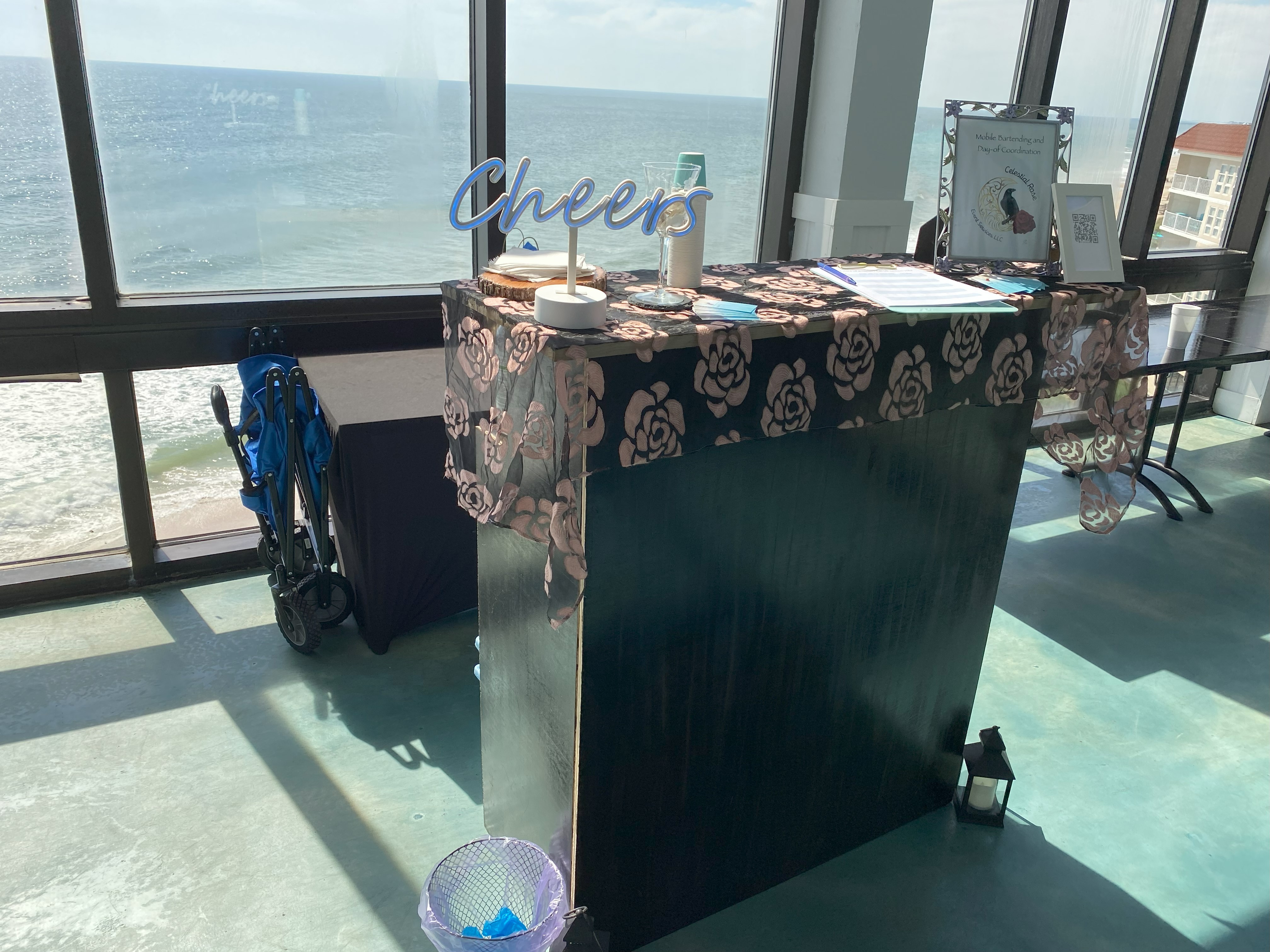 Mobile bar set up inside overlooking a scenic view of the ocean